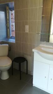 Koupelna v ubytování Le Pavillon de l’île au Trésor + 13 fotografií