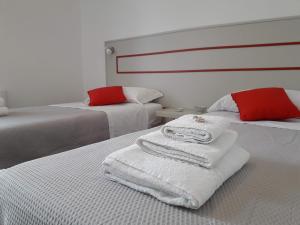 Postel nebo postele na pokoji v ubytování Jolie Julie Accomodation
