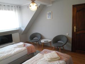 Postel nebo postele na pokoji v ubytování Apartament Esja