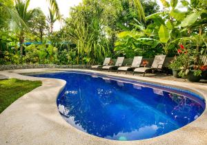 Bazén v ubytování Villas Oasis nebo v jeho okolí