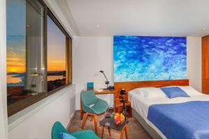 Posteľ alebo postele v izbe v ubytovaní Horizon Luxury Suites & Design Rooms