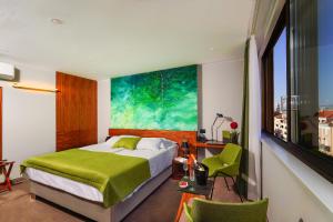 Posteľ alebo postele v izbe v ubytovaní Horizon Luxury Suites & Design Rooms