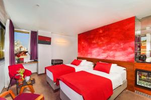 Posteľ alebo postele v izbe v ubytovaní Horizon Luxury Suites & Design Rooms