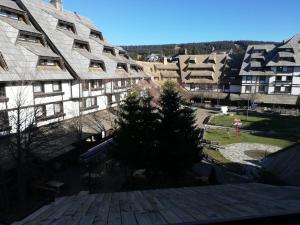 arial view of an apartment building with a park at Sweet Home Konaci in Kopaonik