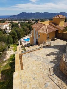 Bazén v ubytovaní Chalet Benidorm alebo v jeho blízkosti