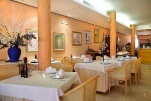 Restoranas ar kita vieta pavalgyti apgyvendinimo įstaigoje Hotel Ristorante Miralago