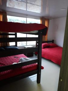 Ένα ή περισσότερα κρεβάτια σε δωμάτιο στο Hotel Casa Blanca Mirador