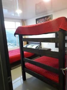Двухъярусная кровать или двухъярусные кровати в номере Hotel Casa Blanca Mirador