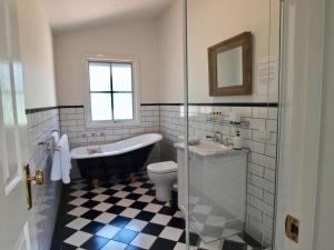 A bathroom at Tiffany's Cottages