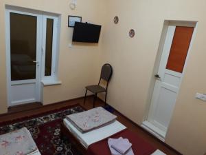 Televisyen dan/atau pusat hiburan di Amir-Yaxyo Hotel