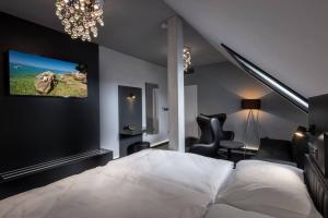 Postel nebo postele na pokoji v ubytování Hotel Grand