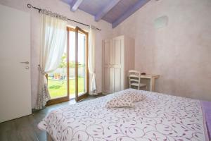 Posteľ alebo postele v izbe v ubytovaní Charming Villa Luce Ribari in Istria Countryside + 37 fotografií