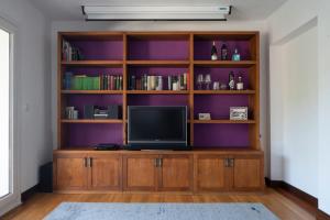 A television and/or entertainment centre at Armintza Port by Aston Rentals