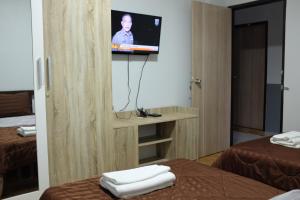 Postel nebo postele na pokoji v ubytování WJ Residence at Suvarnaphumi