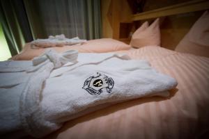 Voodi või voodid majutusasutuse Hotel Gasthof Brüggler toas