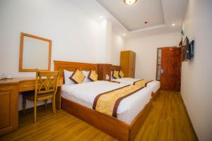 Katil atau katil-katil dalam bilik di Hồng Tùng Hotel