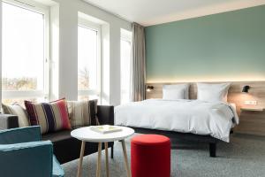 Postel nebo postele na pokoji v ubytování sylc. Apartmenthotel – Serviced Apartments + 37 fotografií