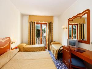 TV a/nebo společenská místnost v ubytování Hotel Albatros