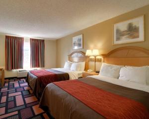Ένα ή περισσότερα κρεβάτια σε δωμάτιο στο Quality Inn & Suites Malvern