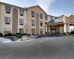 a large building with a parking lot in front of it at Quality Inn & Suites Malvern in Malvern