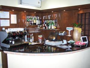 Nápoje v ubytování Hotel Ristorante La Torretta