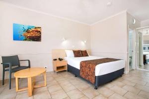 Postel nebo postele na pokoji v ubytování Comfort Inn Cairns City