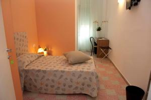 Postel nebo postele na pokoji v ubytování Hotel Venere