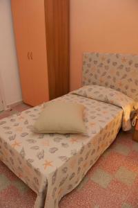 Postel nebo postele na pokoji v ubytování Hotel Venere