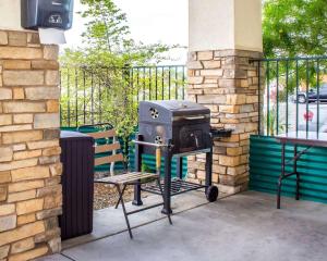 a grill and a chair on a patio at Comfort Inn and Suites Yuma I-8 in Yuma