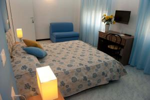 Postel nebo postele na pokoji v ubytování Hotel Venere