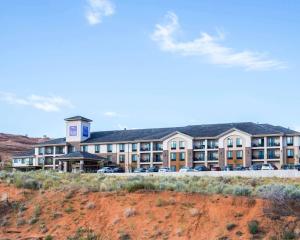 a large hotel with cars parked in front of it at Sleep Inn & Suites Page at Lake Powell in Page