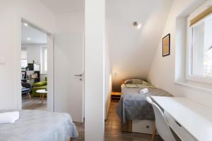 Säng eller sängar i ett rum på Felix apartment Tour As Ljubljana