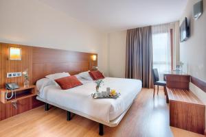 Postel nebo postele na pokoji v ubytování Hotel Zalle Don Fernando + 30 fotografií