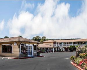 a building with a parking lot in front of it at The Inn at 1252 Monterey in Monterey
