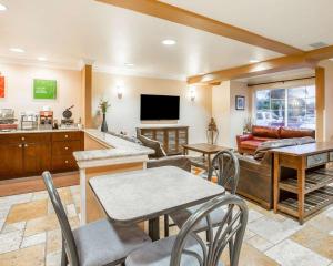 a living room with a couch and a table at Comfort Inn & Suites Salinas in Salinas