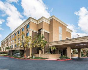 a building on a street in front of a parking lot at Comfort Inn Chula Vista San Diego South in Chula Vista