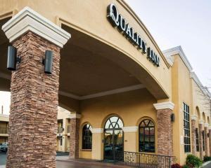 a store front of a shopping center with a sign on it at Quality Inn Chico in Chico