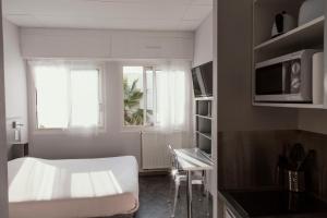 Postel nebo postele na pokoji v ubytování Smartappart Lorient