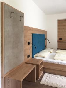 Postel nebo postele na pokoji v ubytování Guesthouse Rungg