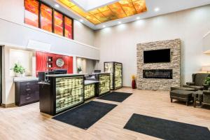 a lobby of a hospital with a fireplace at Comfort Inn in Owen Sound