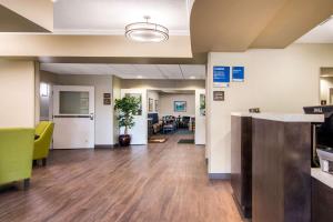 a lobby of a hospital with a waiting room at Comfort Inn & Suites Red Deer in Red Deer