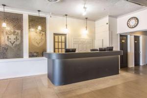 Posezení v ubytování Hôtel Le Principal
