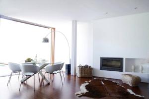 TV a/nebo společenská místnost v ubytování Amplia casa con piscina cerca playa