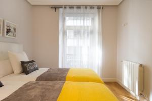 Łóżko lub łóżka w pokoju w obiekcie Sausalito - Iberorent Apartments