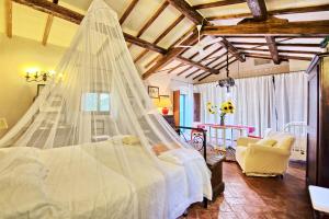 A bed or beds in a room at Villa Elisa by PosarelliVillas