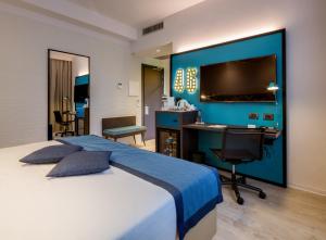 Postel nebo postele na pokoji v ubytování Best Western Hotel Cristallo