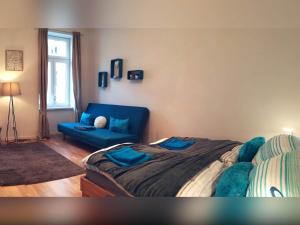 Posteľ alebo postele v izbe v ubytovaní Lovely Studio Apartment Volkertmarkt