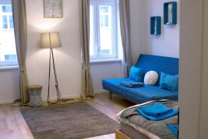 Posedenie v ubytovaní Lovely Studio Apartment Volkertmarkt
