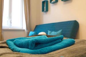 Posteľ alebo postele v izbe v ubytovaní Lovely Studio Apartment Volkertmarkt