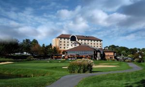 a building on a golf course with a green at Heritage Hills Golf Resort & Conference Center in York